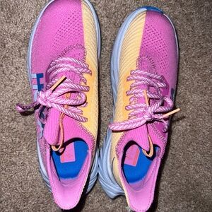 Hoka Pink and Yellow Athletic Shoes